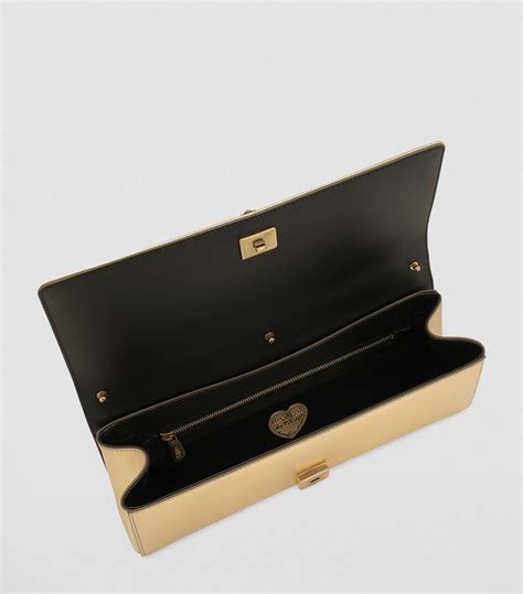 dolce gabbana baguettes|Devotion baguette bag in Gold for Women.